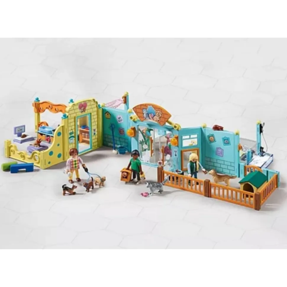 Centre de soin canin : 8 chiens et soigneur - Playmobil
